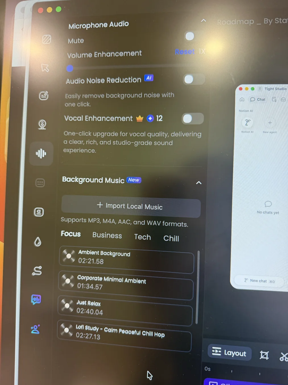FocuSee Audio Control panel showing microphone mute, volume enhancement, AI noise reduction, vocal enhancement, local music import, and built-in Focus, Business, Tech, and Chill background music categories